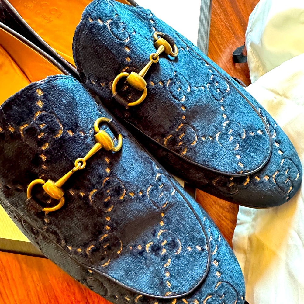 My Gucci dress shoes.  Size 13 US Blue suede shoes.  Purchased at Gucci